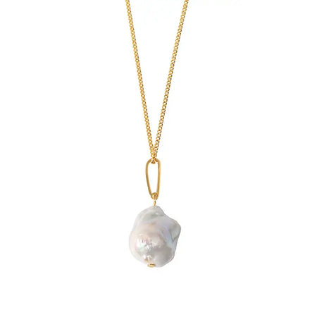 The image features a delicate and elegant baroque pearl pendant necklace. The pendant is a large, irregularly shaped pearl with a lustrous white finish, showcasing the unique and natural beauty of baroque pearls. It hangs from a slender gold chain, enhancing the pearl's radiant glow with its warm color. The simplicity of the design, focusing on the singular pearl, highlights the sophistication and timeless appeal of this jewelry piece, making it a perfect accessory for both formal and casual outfits.
