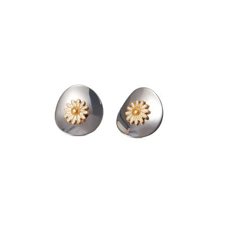 a pair of sophisticated earrings featuring a sleek, silver dome design adorned with a central daisy motif in gold. The design cleverly combines simplicity with a touch of nature, emphasizing elegance through the contrast of the shiny silver finish and the warm golden daisy. Each earring is detailed with a textured center and petals, which enhances the overall aesthetic, making these earrings an exquisite choice for both casual and formal attire.