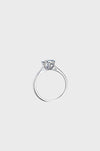 Profile view of the Elysian Moissanite Engagement Ring, showcasing the sleek claw setting that maximises light reflection for ultimate brilliance