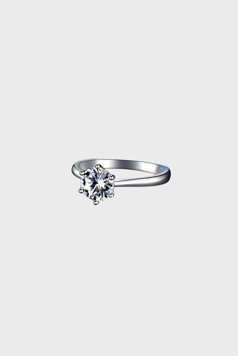 Side angle of the Elysian Moissanite Ring, featuring a round 1.0ct moissanite stone set in polished sterling silver. Affordable and ethical engagement ring UK."