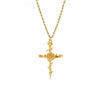 A gold necklace featuring a pendant shaped like a cross adorned with a detailed rose in the center and smaller floral elements extending from the arms of the cross. The chain is also gold with a twisted design. The pendant and chain create a cohesive and elegant piece of jewelry.