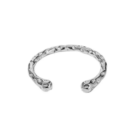 Hammer Silver Bracelet featuring a unique hammered texture with raised, organic patterns, displayed on a plain white background. This high trending accessory is perfect for making bold and sophisticated fashion statements, adding a touch of elegance to any ensemble.