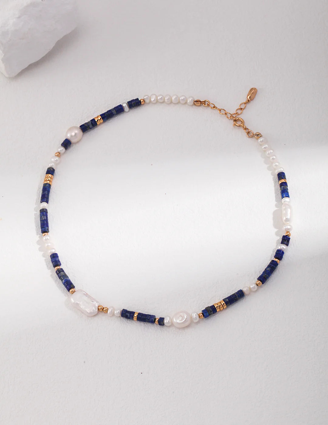 Full-length Navy Blue Lapis Lazuli and Baroque Pearls Choker by Anaïs & Aimee with gold chain
