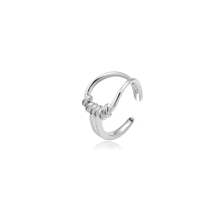 Twist Silver Adjustable Ring featuring a unique open-ended design with a central knot detail, crafted in polished silver-tone metal. This high trending accessory adds a touch of modern elegance and sophistication, perfect for any occasion.