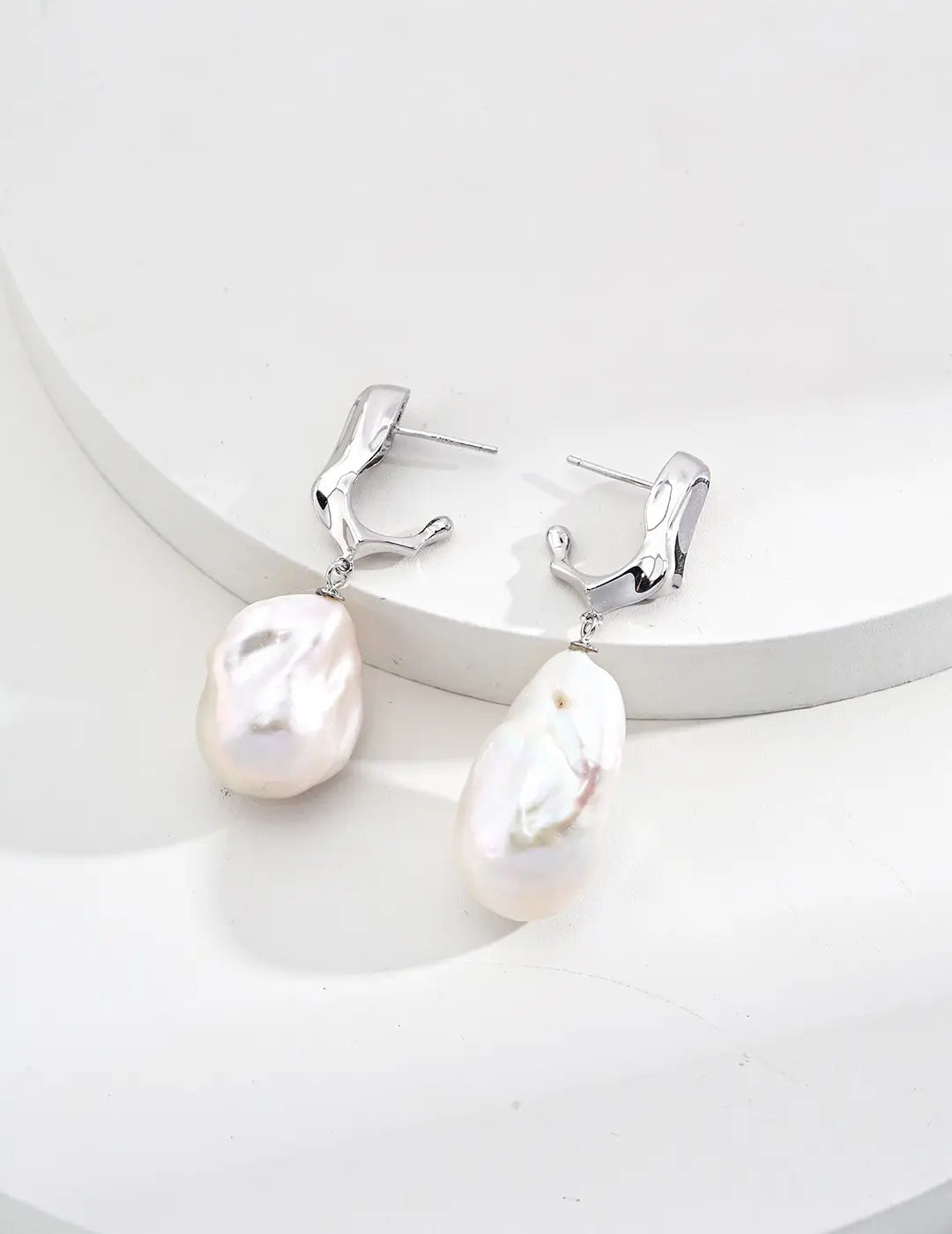 Anaïs & Aimee Lumière Baroque Pearl Earrings in silver and gold with natural pearls.