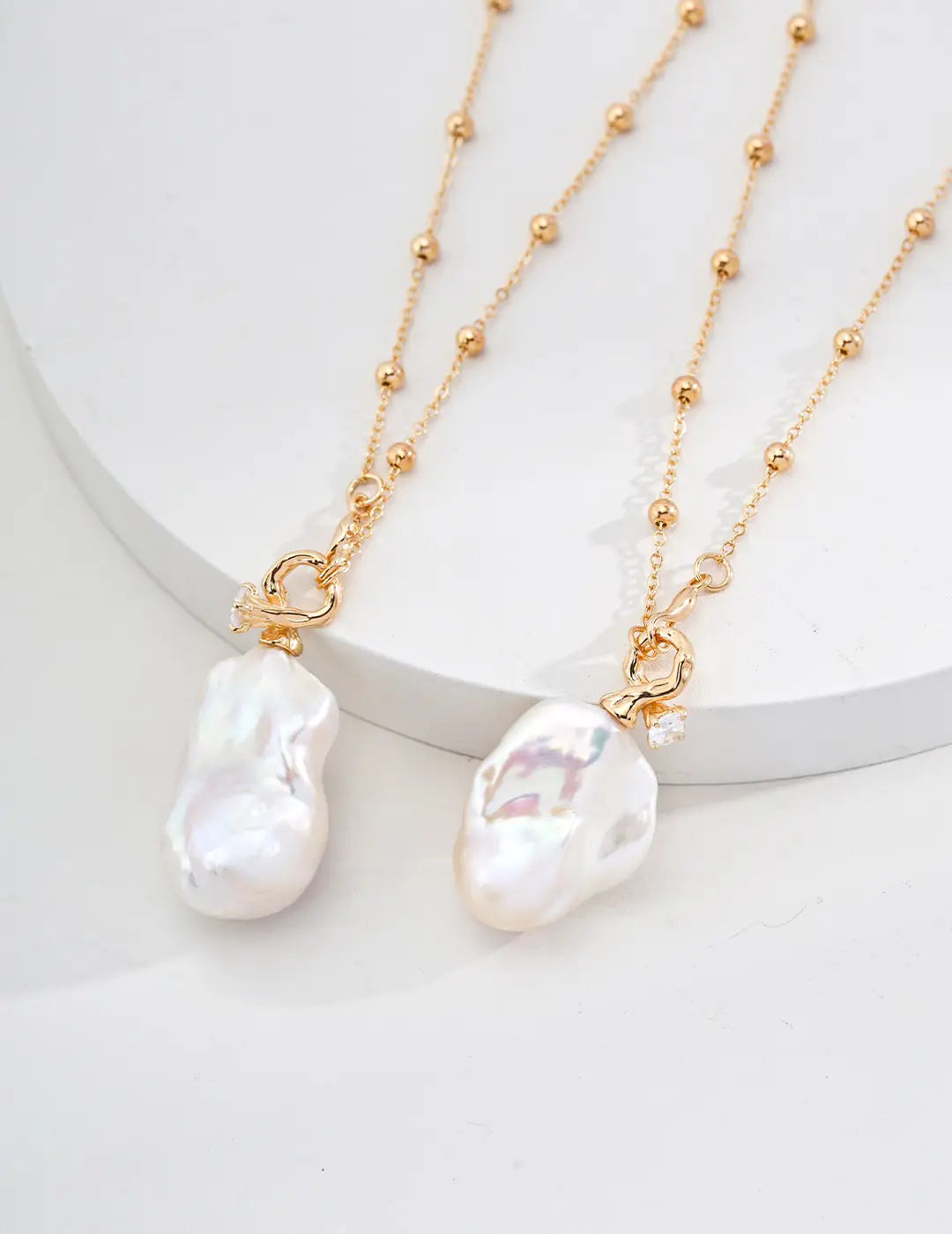 Both Nemesis Pearl Necklace showing the close-up detail