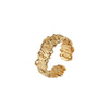  The image displays a stylish gold ring featuring a distinctive spiral design, composed of multiple segments that give it a layered appearance. Each segment is finely crafted with textural details that enhance its reflective qualities, showcasing the luxurious shine and artistry of gold jewelry. This ring combines elegance with a modern twist, suitable for various fashion styles and occasions.