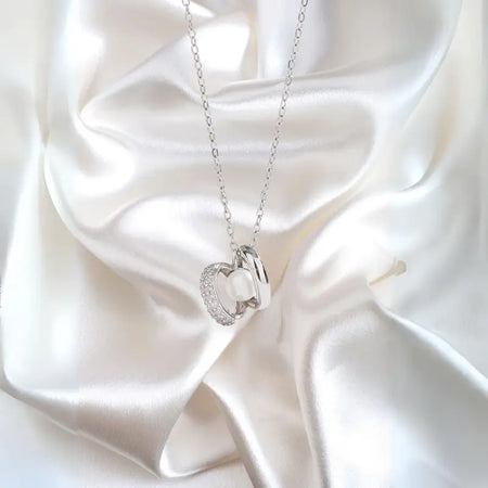 Elegant Pearl Embrace Necklace in Silver with Sparkling Pavé Accent
