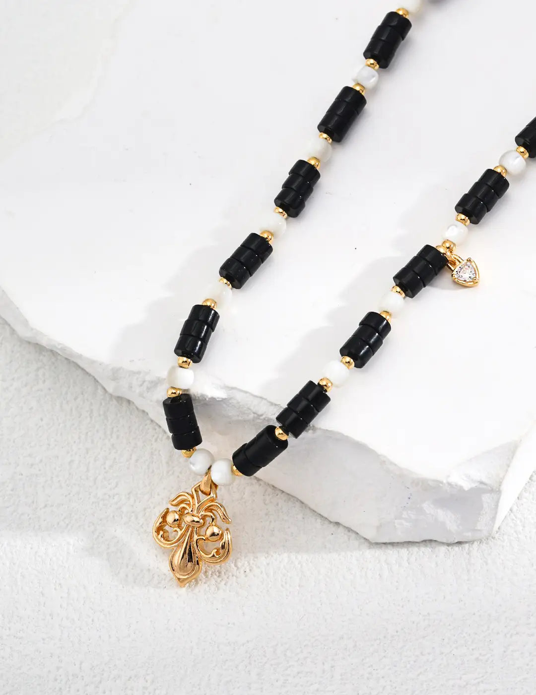 Close-up of Anaïs & Aimee Royal Black Obsidian Pearl Necklace with beads and pearls