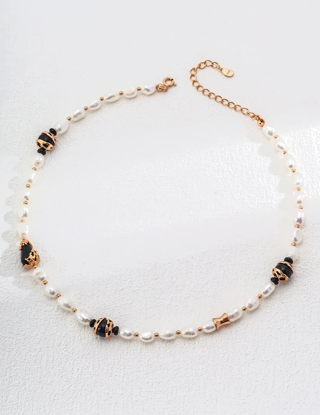 Serenity Black Obsidian Pearl Necklace by Anaïs & Aimee with black gemstones and pearls