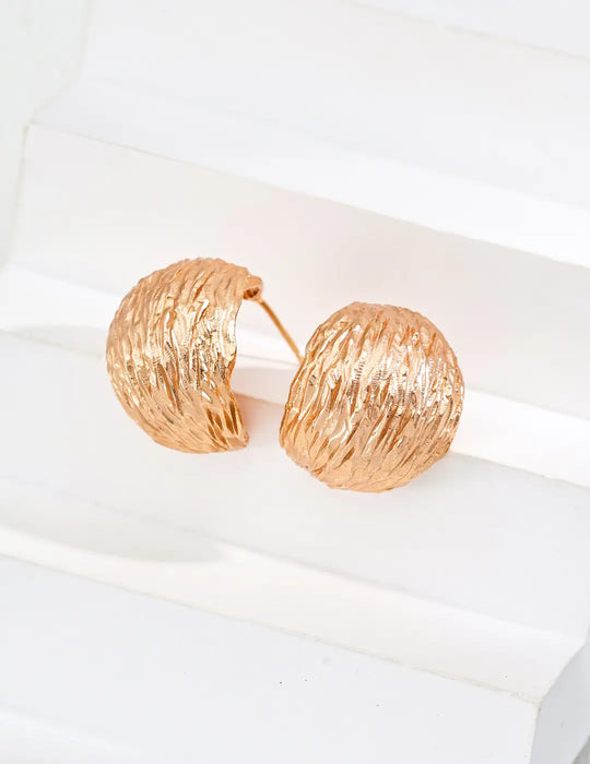 Anaïs & Aimee's Vintage Textured Hoop Earrings in gold, beautifully crafted with a bold, natural-inspired texture for an elegant and timeless look.