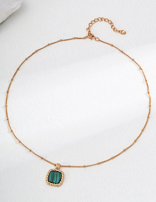 Vintage Gold Malachite Pendant Necklace by Anaïs & Aimee - Elegant green gemstone jewelry perfect for UK fashion trends.