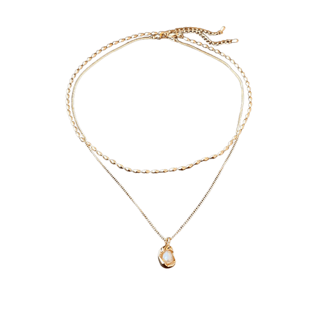  an elegant layered necklace, featuring two distinct yet complementary gold chains. The shorter chain has a simple, delicate design, while the longer chain includes a small, lustrous pearl pendant encased in a gold setting that enhances its natural glow. This necklace combines minimalistic and classic elements, creating a versatile accessory perfect for both everyday wear and more formal occasions. The layering of the chains adds depth and a contemporary feel to the piece