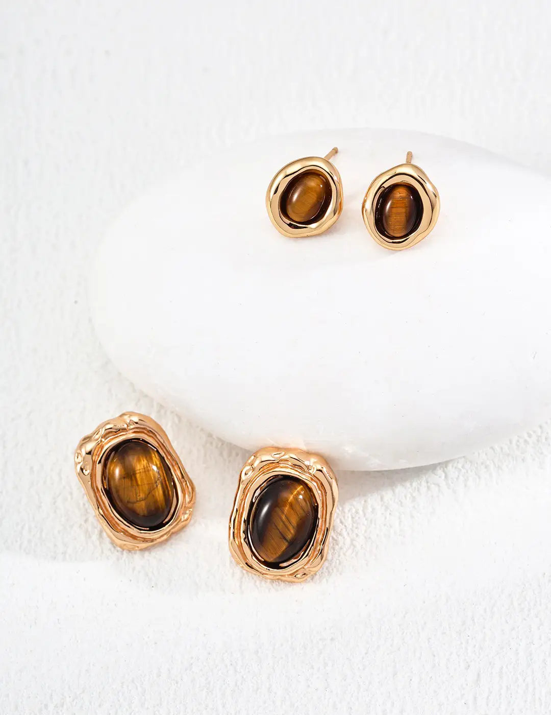 Elegant Anaïs & Aimee Tiger's Eye Round Earrings in sterling silver and gold, perfect for adding a touch of natural beauty to UK wardrobes.